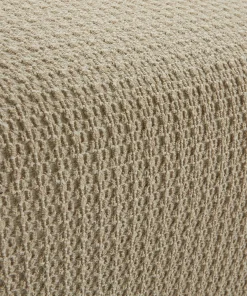 Housse de fauteuil ou de canapé bi-extensible.